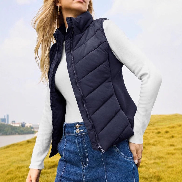 Women's quilted thermo vest with high stand-up collar and elastic side inserts Mune Fashion