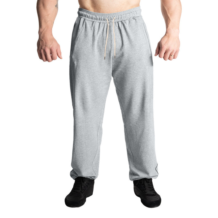 Men's casual jogging pants with elastic drawstring waistband, subtle side stripe, and deep side pockets Mune Fashion