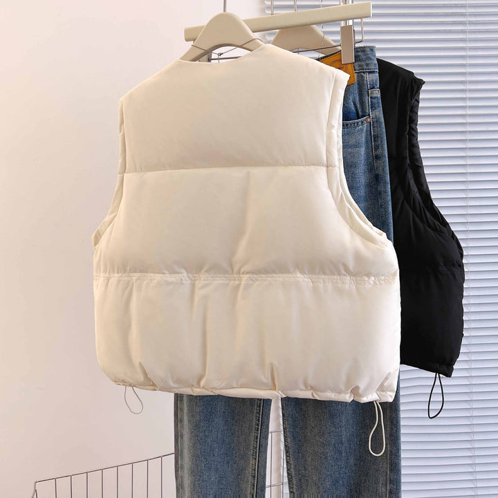 Women's short padded quilted vest with drawstring hem and round neck Mune Fashion