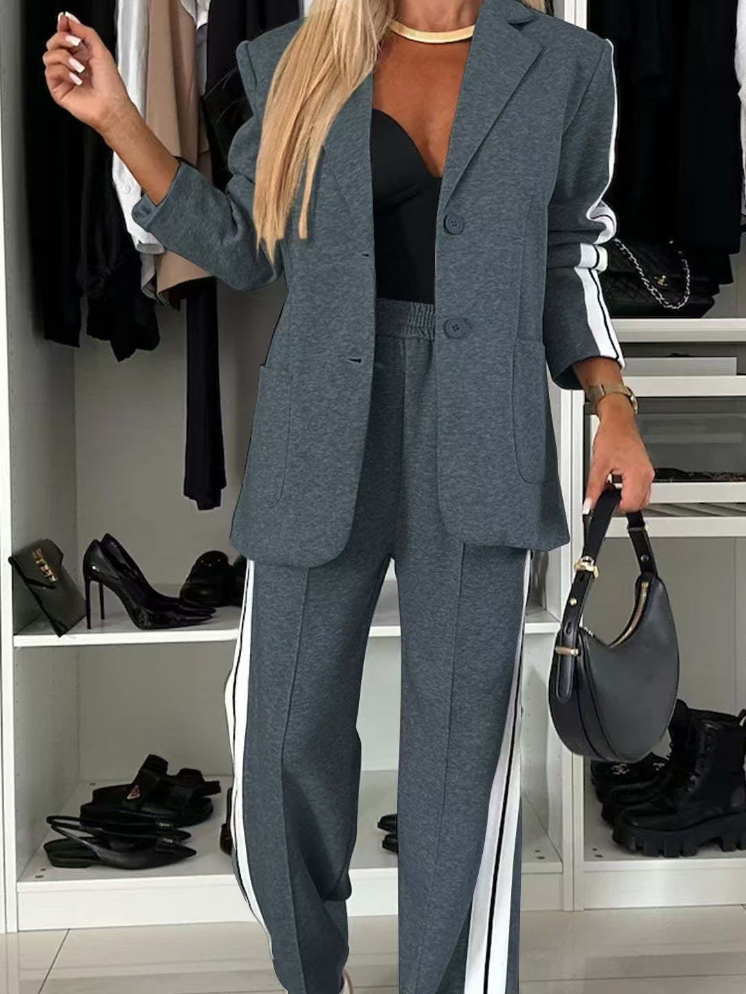 Women's elegant blazer set in sports chic with contrasting side stripes and elasticated waistband trousers Mune Fashion