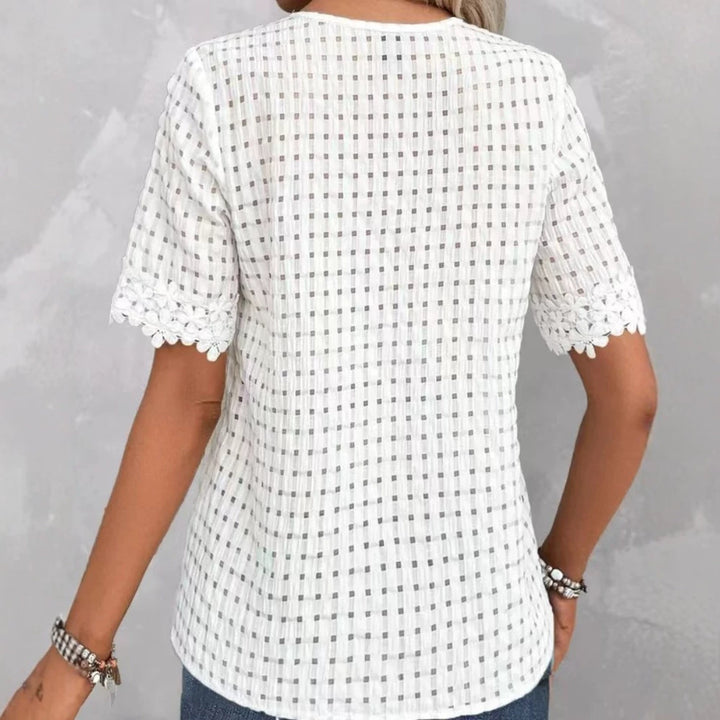 Women's lightweight structured shirt with check mesh, decorative lace trim at the V-neck and short sleeve hems Mune Fashion