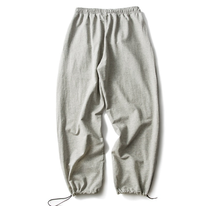 Unisex Relaxed-Fit Jogging Pants with elastic waistband, drawstring, and adjustable hem