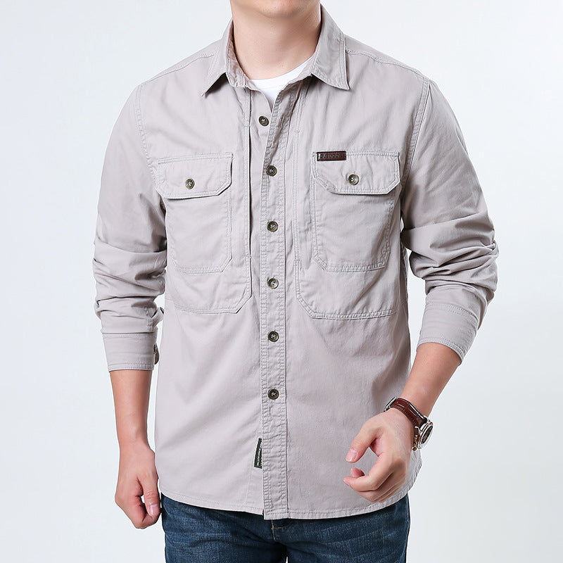 Men's casual utility shirt jacket made of cotton twill with two patch breast pockets and buttonable front.