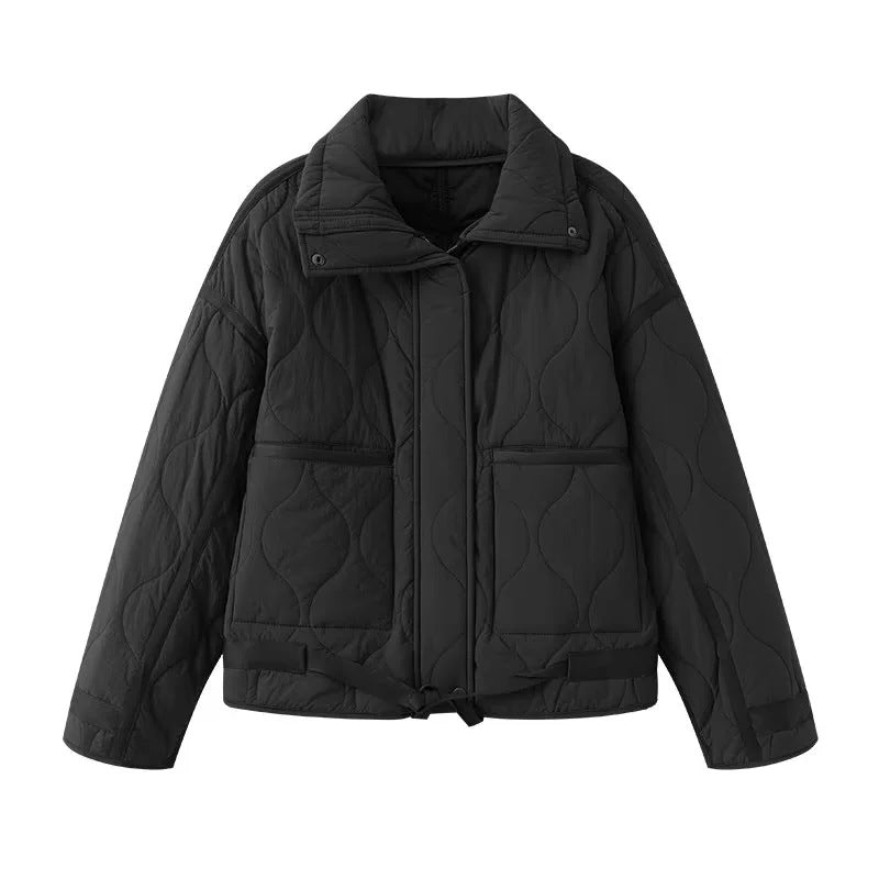 Women's quilted boxy transitional jacket with drawstring hem, stand-up collar, and patch pockets Mune Fashion