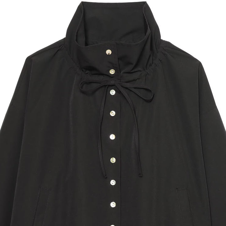 Women's short jacket in blouson style with high stand-up collar and drawstring