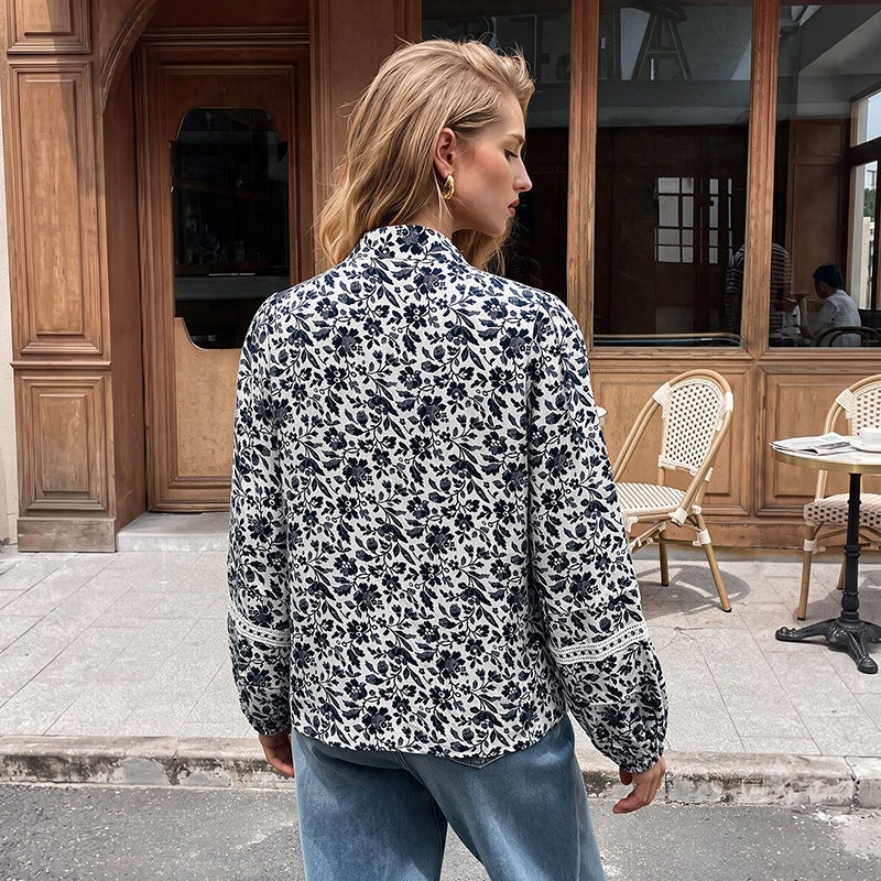 Women’s blouse with floral pattern and long puff sleeves Mune Fashion