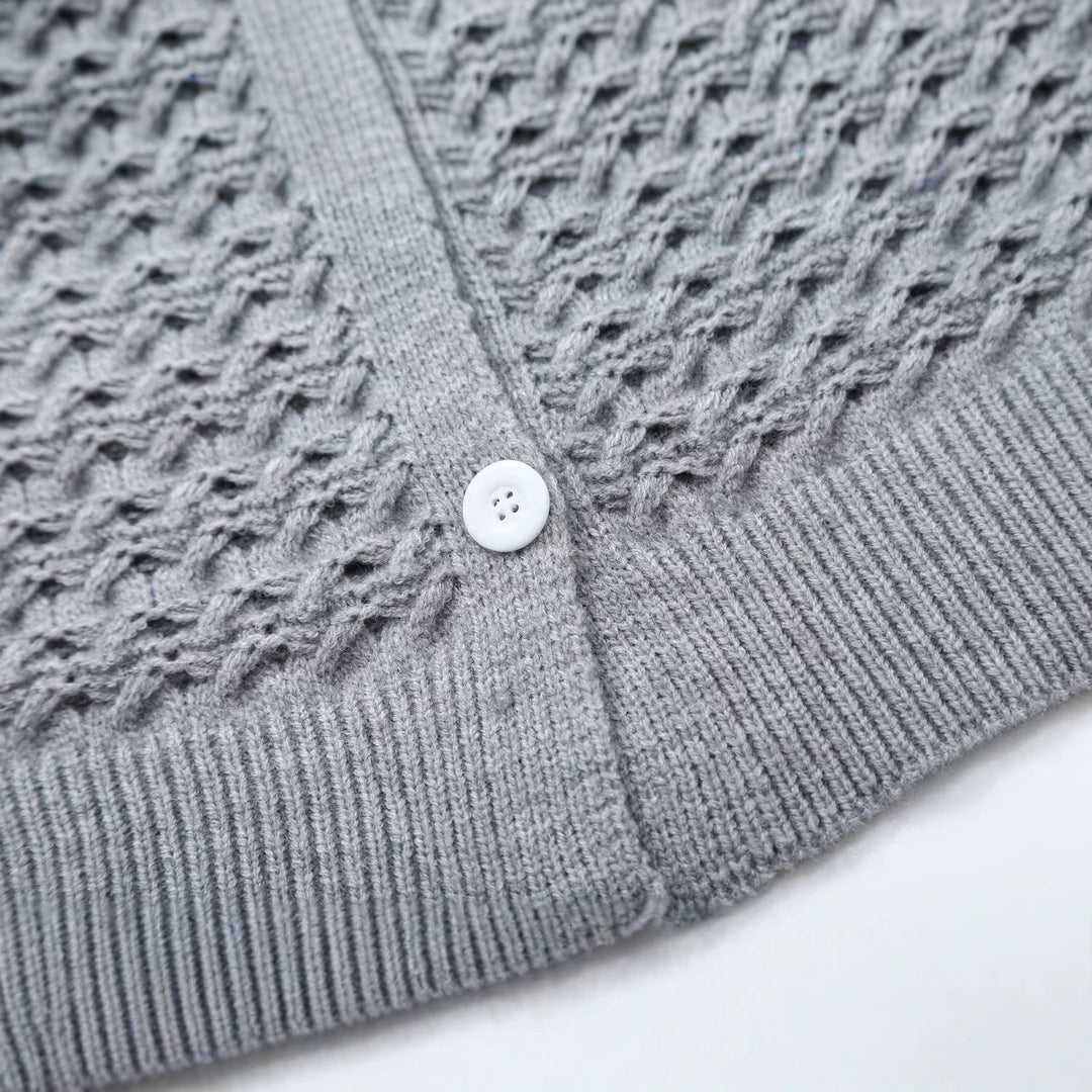 Women's structured cardigan with round yoke, textured stitch pattern and button placket Mune Fashion