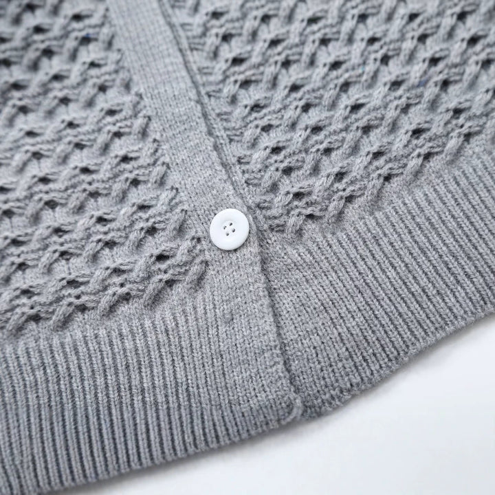 Women's structured cardigan with round yoke, textured stitch pattern and button placket Mune Fashion