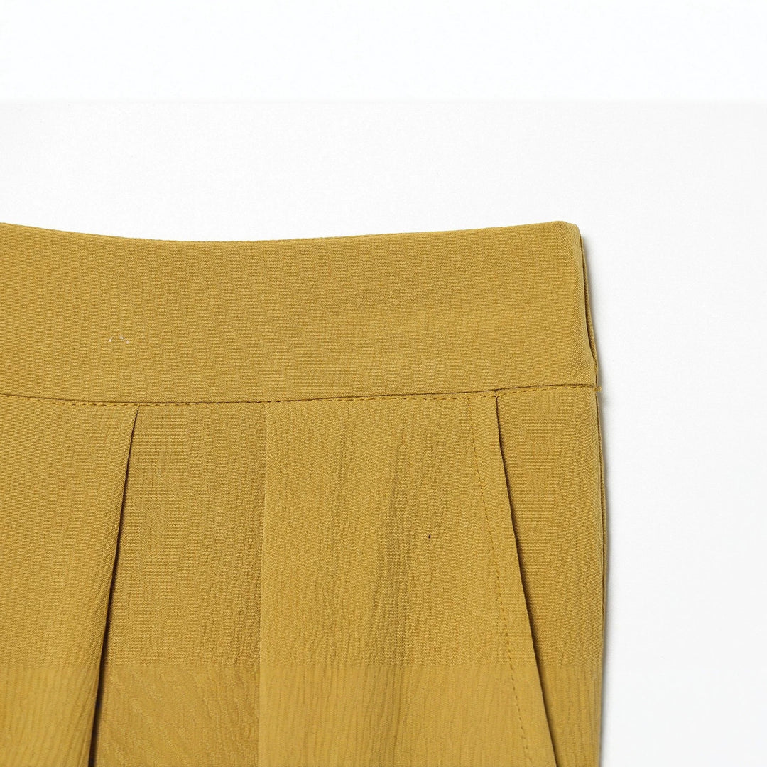 Women’s harem pants with high waistband, pleated folds and knotted cuffs Mune Fashion