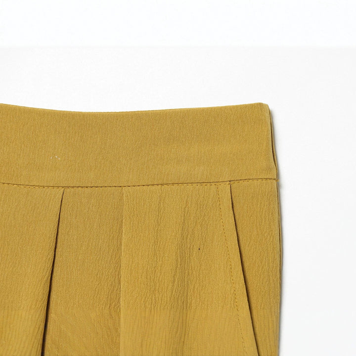 Women’s harem pants with high waistband, pleated folds and knotted cuffs Mune Fashion