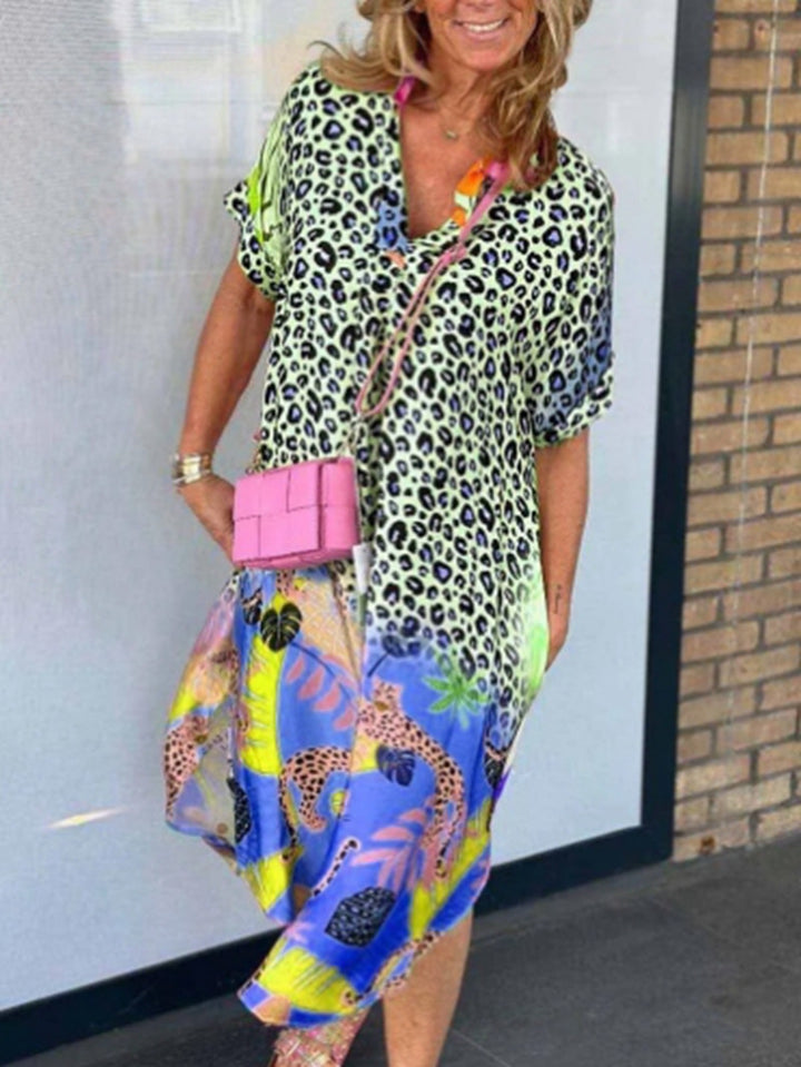 Women's loosely fitted V-neck midi dress with leopard and tropical print Mune Fashion