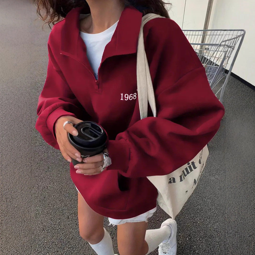 Women's oversized half-zip sweatshirt with high collar, kangaroo pocket, and casual oversized fit Mune Fashion