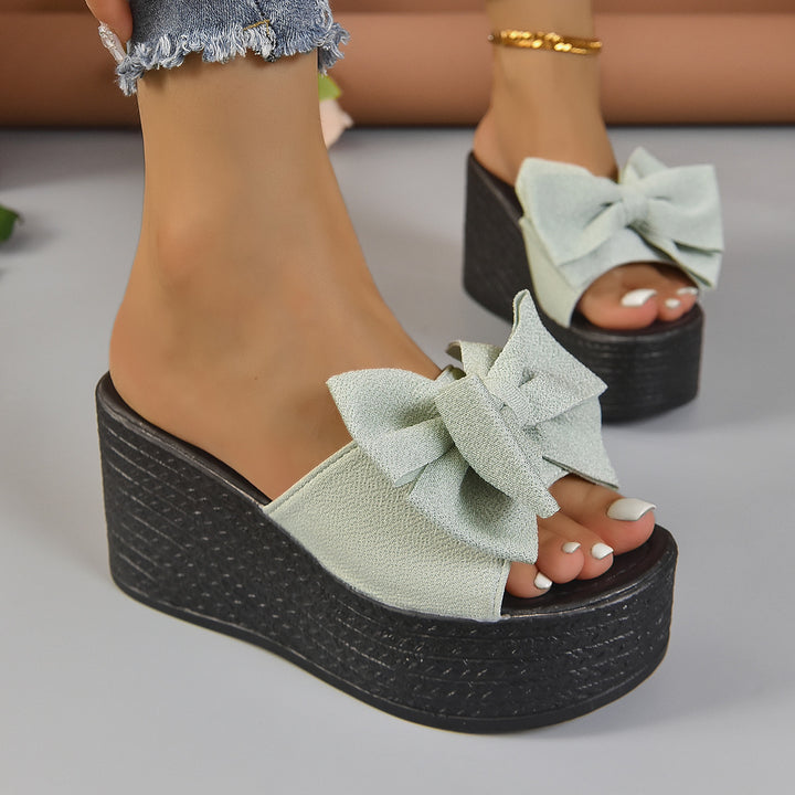 Women's wedge sandals with large decorative bow and fabric-covered platform Mune Fashion