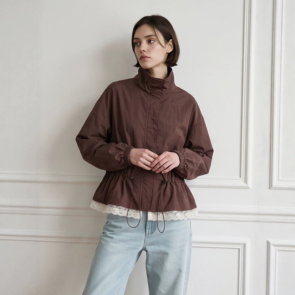 Women's oversized windbreaker with high stand-up collar, drawstring waist, and elastic cuffs