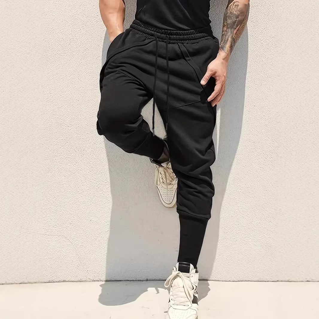 Men's Tapered Jogging Pants with Drop Crotch, Elastic Waistband & Diagonally Placed Pockets Mune Fashion