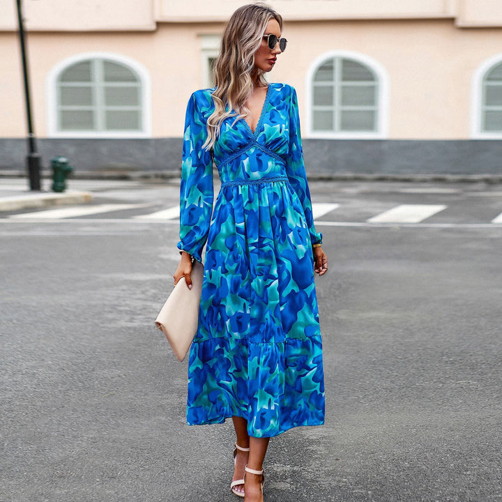 Women's flowing maxi dress with V-neck, gathered empire waist and tiered skirt Mune Fashion