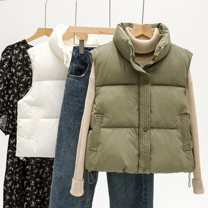 Women's sleeveless padded quilted vest with high stand-up collar and drawstring Mune Fashion