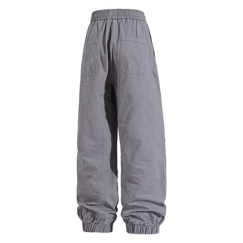 Men's Oversized Utility Jogging Pants made of sturdy cotton blend with drawstring waistband, side cargo pockets & ribbed cuffs Mune Fashion