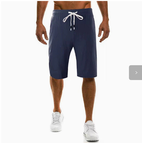 Men's light linen pants with elastic waistband, wide leg, and side pockets Mune Fashion