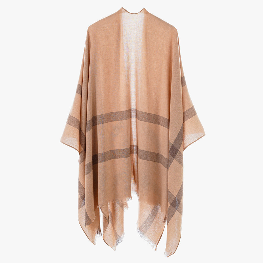 Women’s lightweight fine knit cape with diagonal contrasting stripes and fringes Mune Fashion