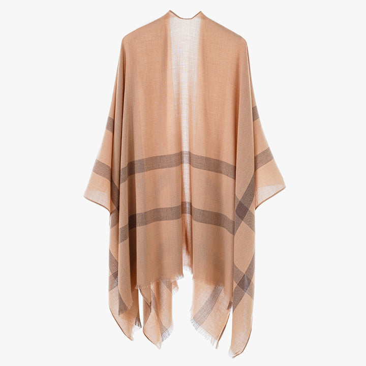 Women’s lightweight fine knit cape with diagonal contrasting stripes and fringes Mune Fashion