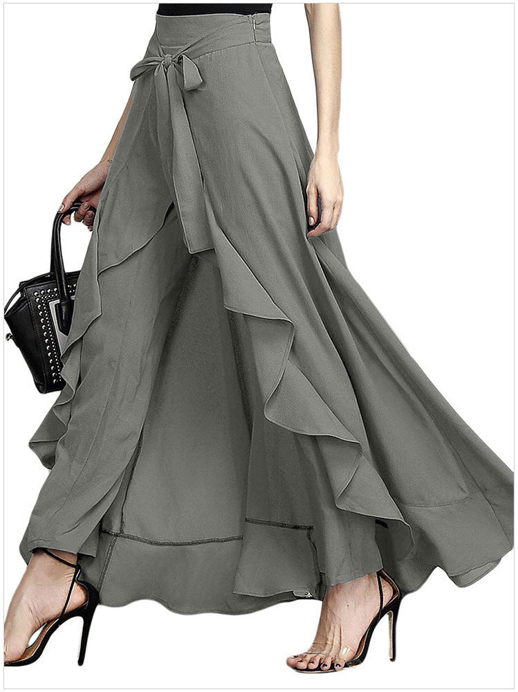 Ladies in airy maxi skirt with ruffles, wrap look and waistband Mune Fashion