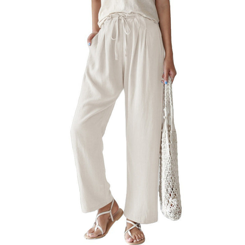 Ladies casual linen pants with wide legs, elastic waistband and side pockets Mune Fashion