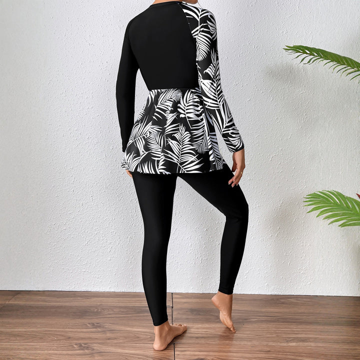 Damen Sportlicher Langarm Badeanzug mit Rüschendetails Echo Archiv