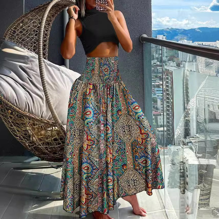 Ladies nan maxi skirt with high smocked waist and flowing boho pleated look Mune Fashion