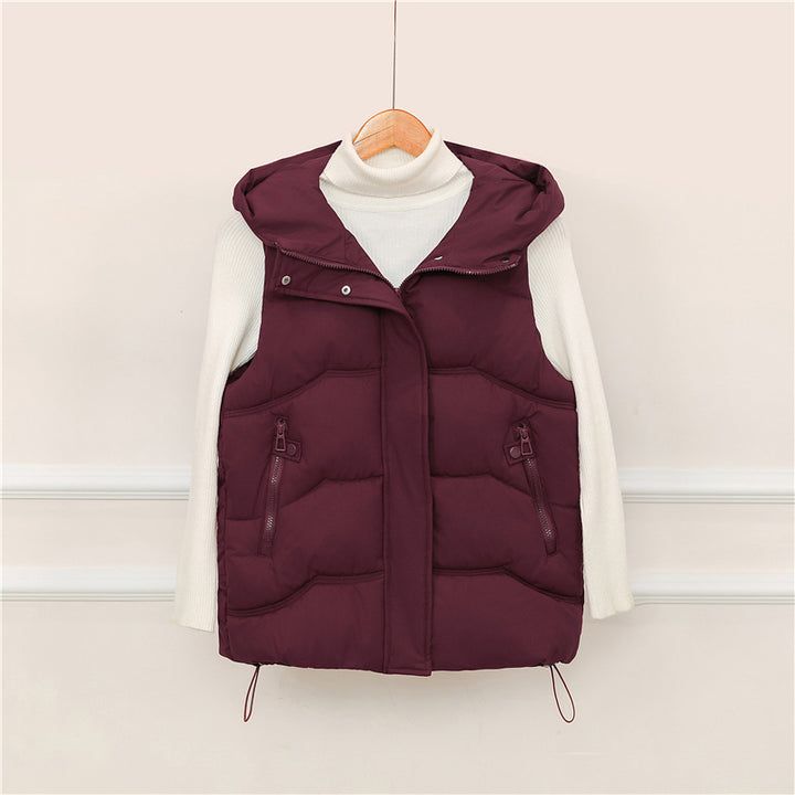 Women's nano-padded hooded vest with concealed zip placket, adjustable drawstring waist and functional zip pockets Mune Fashion