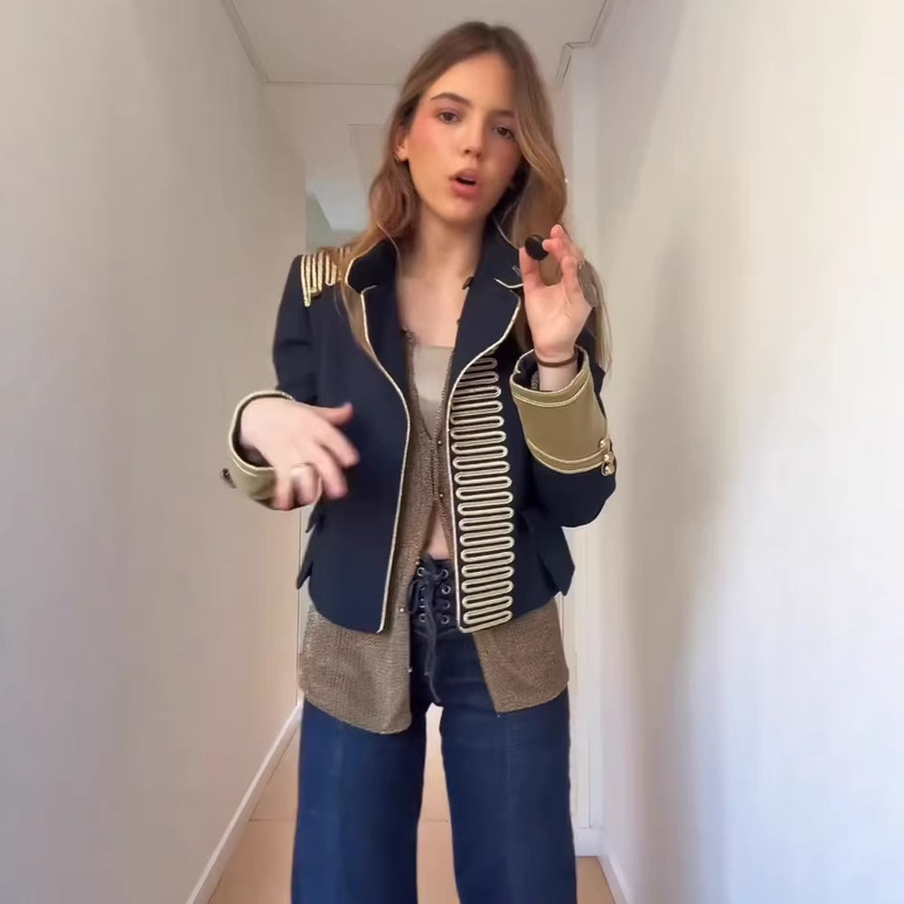 Women’s military-inspired short jacket with gold cord trim and stand-up collar Mune Fashion