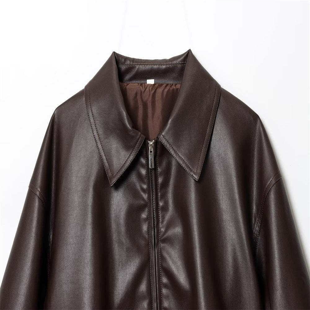 Women's short-cut oversized blouse jacket made of vegan leather with shirt collar and elastic hem Mune Fashion