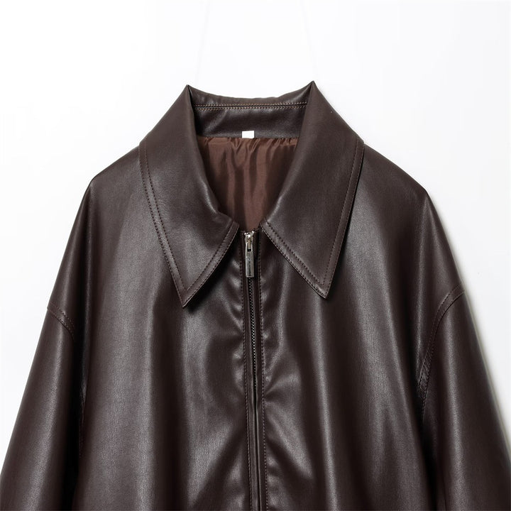 Women's short-cut oversized blouse jacket made of vegan leather with shirt collar and elastic hem Mune Fashion