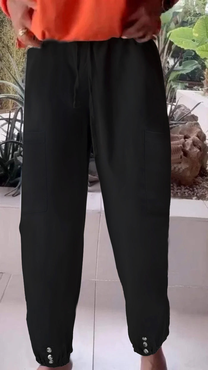 Ladies cargo jogging pants with drawstring, patch pockets and button cuffs Mune Fashion