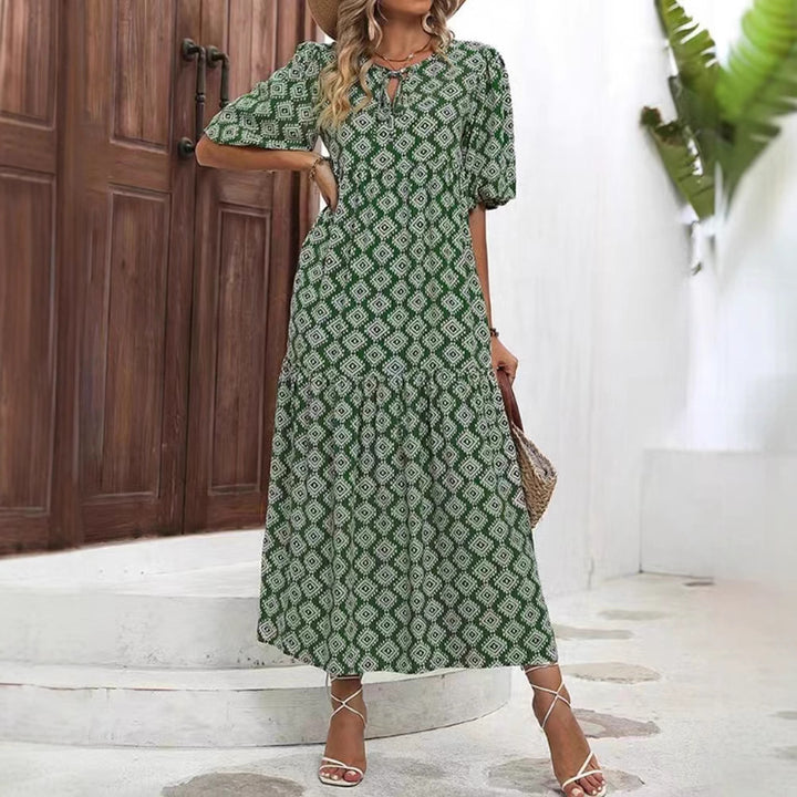 Women’s airy maxi dress with geometric ethnic print, gathered tiered skirt and keyhole neckline Mune Fashion