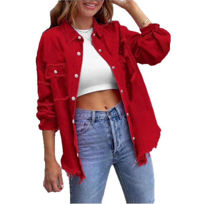 Women's oversized denim shirt jacket with fringe trim, flap pockets, and snap front Mune Fashion