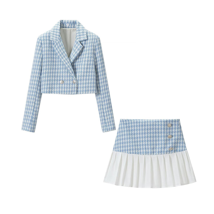 Ladies two-piece short blazer and pleated skirt ensemble in houndstooth style Mune Fashion