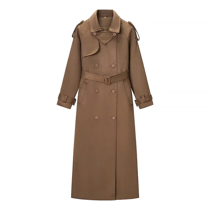 Ladies long trench coat with double-breasted front, waist belt, epaulettes, and cuff detail Mune Fashion