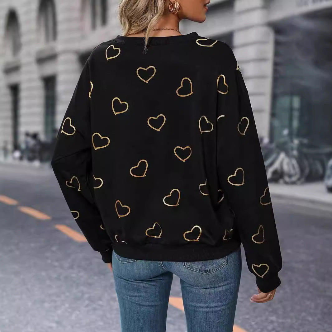 Women's loose heart print sweatshirt with round neck and ribbed cuffs Mune Fashion