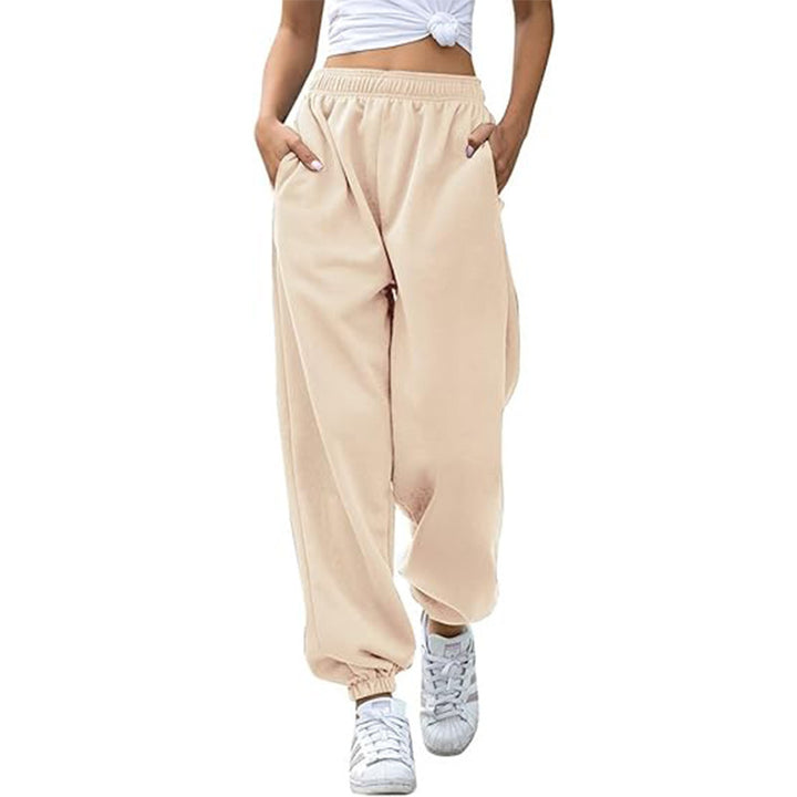 Women's wide High-Waist jogging pants made of soft fleece with elastic waistband, side pockets, and narrow cuffs Mune Fashion