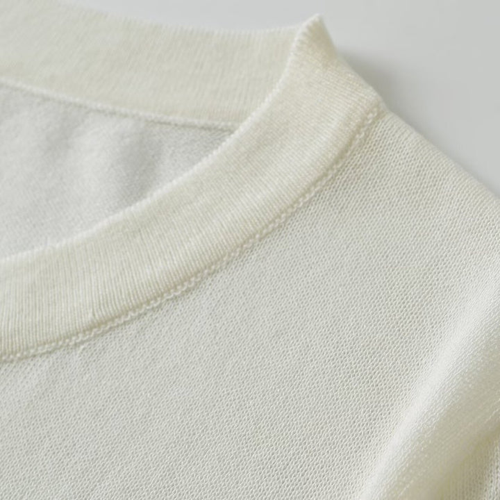 Ladies fine-knit henley pullover with button placket and ribbed hem Mune Fashion
