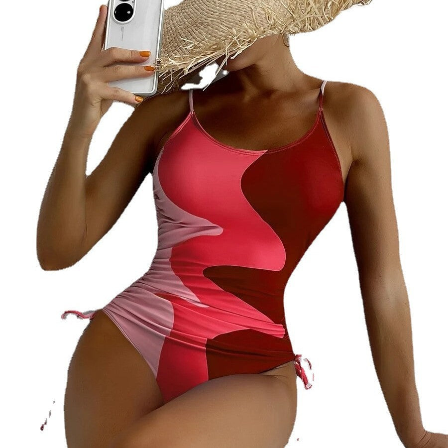 Women's one-piece swimsuit with playful cut-outs and floral design Mune Fashion