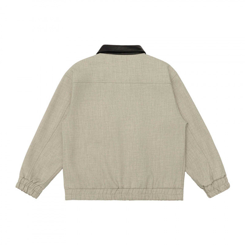 Men's short boxy jacket made of wool blend with contrasting leather collar, zipper and patch pockets Mune Fashion