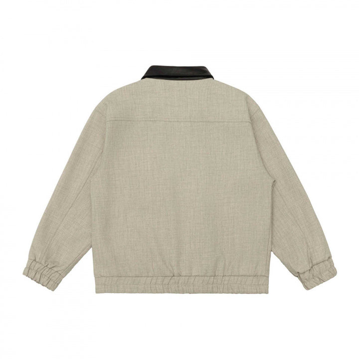 Men's short boxy jacket made of wool blend with contrasting leather collar, zipper and patch pockets Mune Fashion