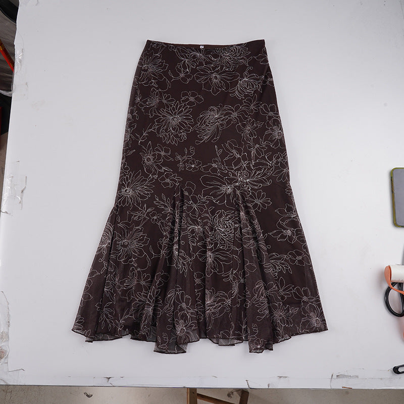 Women’s midi skirt with flared ruffle hem and floral contour print Mune Fashion