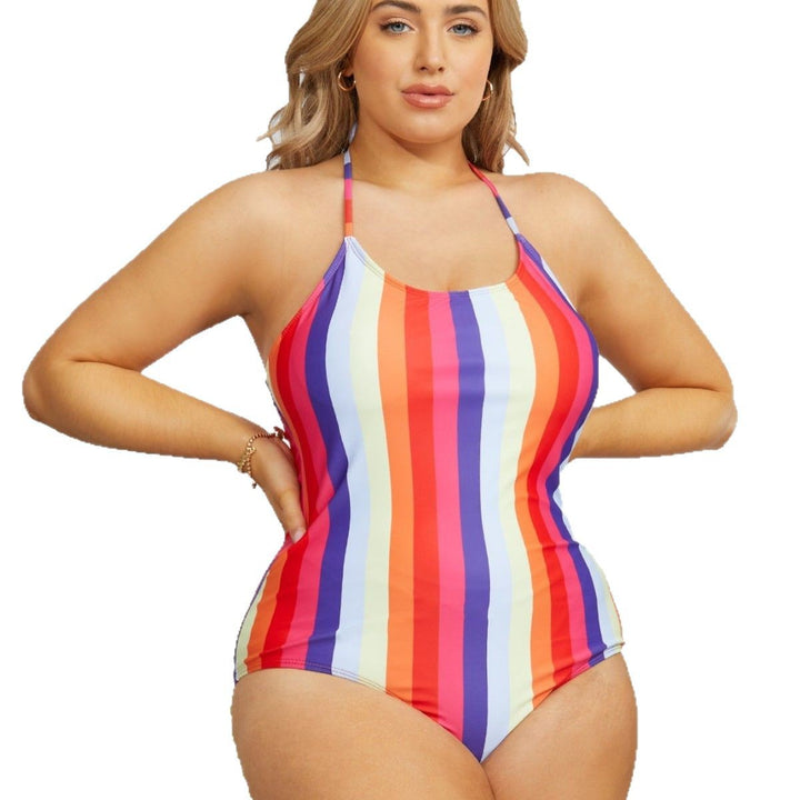 Damen Sportlicher Einteiler Badeanzug mit auffälligem Streifenmuster Echo Archiv