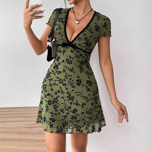Women’s bodycon mini dress with deep V-neck, chiffon overlay and floral velvet look Mune Fashion