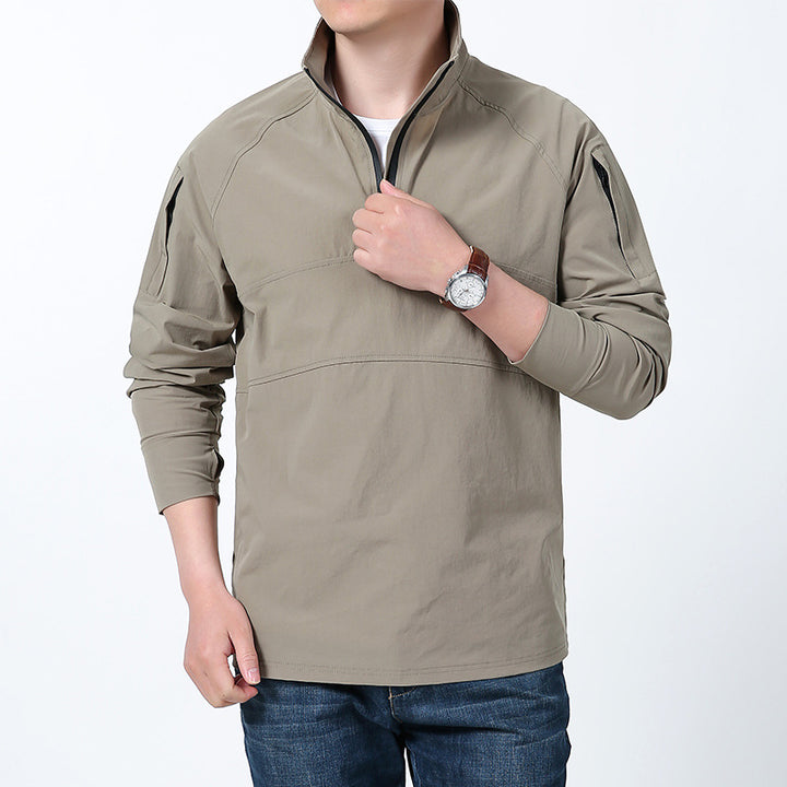Men's softshell pullover with short zipper, arm pocket, and raglan sleeves Mune Fashion