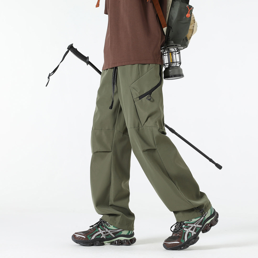 Damen Weite Utility-Cargo-Hose mit Tunnelzugbund, Reißverschluss-Taschen und verstellbaren Beinabschlüssen Mune Fashion