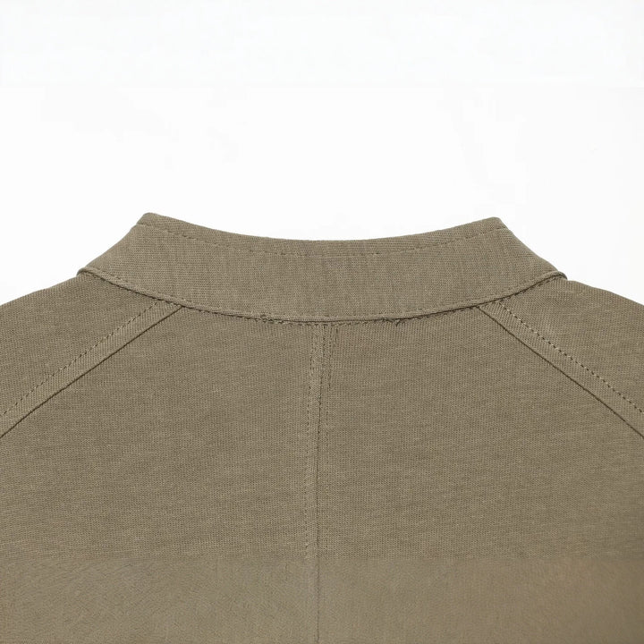 Women’s short-sleeved military-inspired vest with decorative straps and metal buttons Mune Fashion